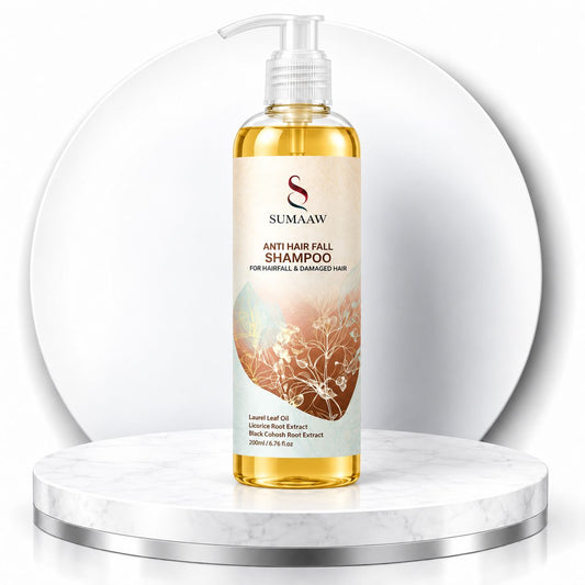 A bottle of Sumaaw Anti Hair Fall Shampoo with a clear pump dispenser, filled with golden-yellow liquid. 