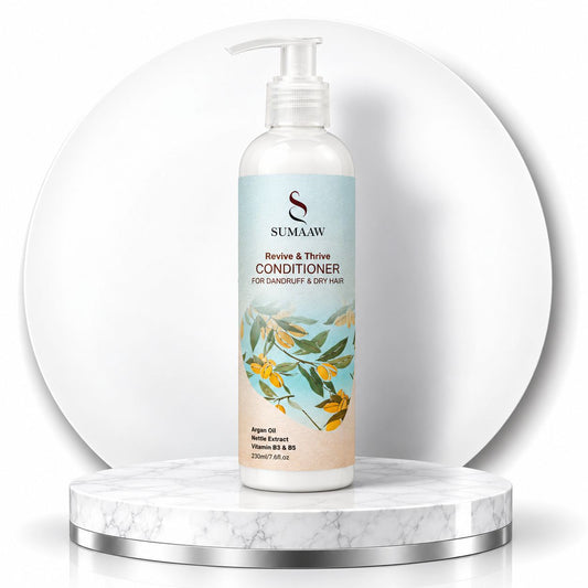 A bottle of Sumaaw Revive & Thrive Conditioner for sand drippy and dry hair
